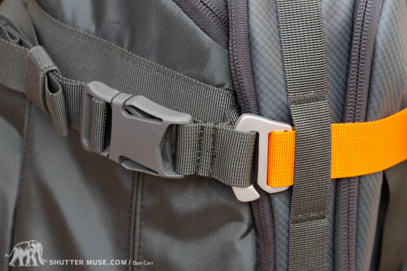 Adjustable front straps look awesome in orange with silver hardware. A nice touch!