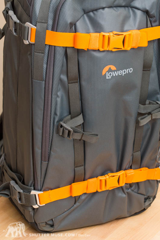 Additional smaller buckles on the front webbing are great for securing poles and ice axe handles. They can be moved around to other areas of the bag to suit.