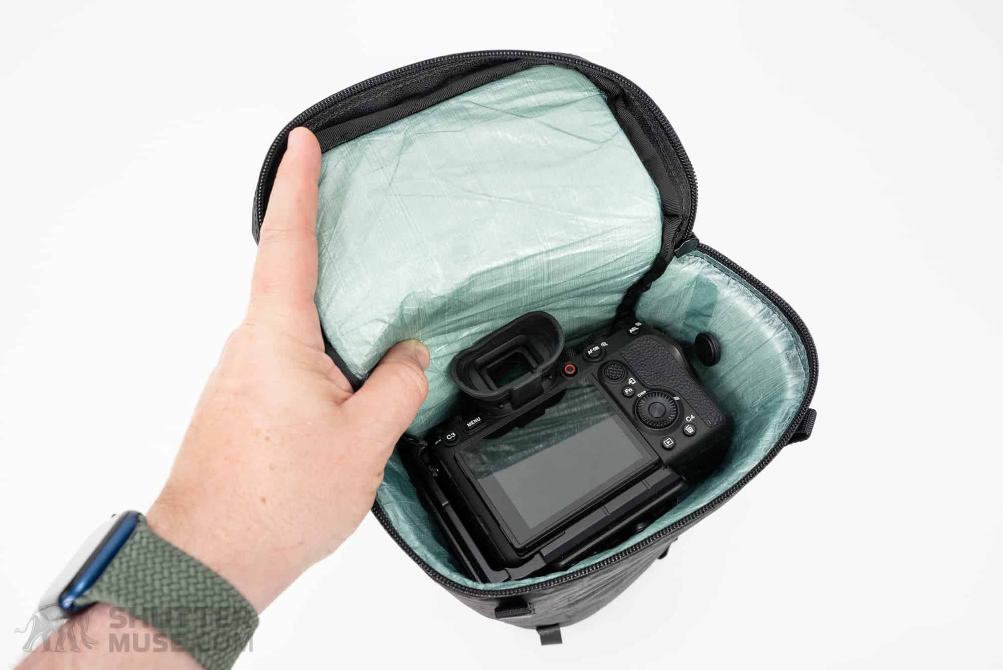 Do You Place Your Camera in Your Backpack With or Without a Lens