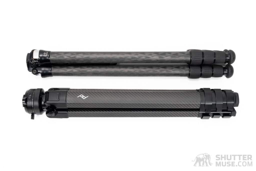 A Really Right Stuff TFC-24L Mk2 tripod and a Peak Design Pro Tall tripod on a white backdrop.